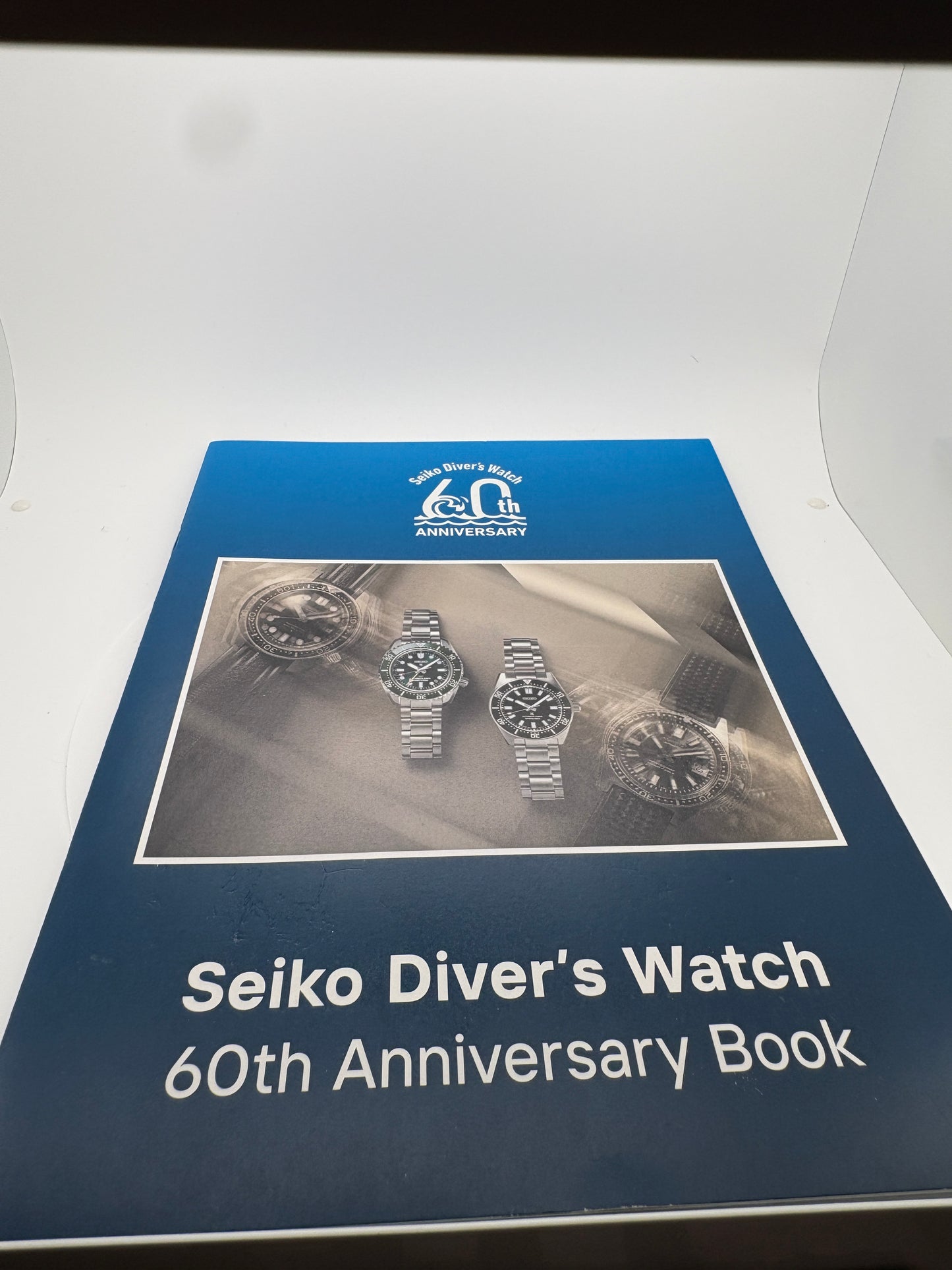Seiko Watch display, key organizer, 150th-anniversary book