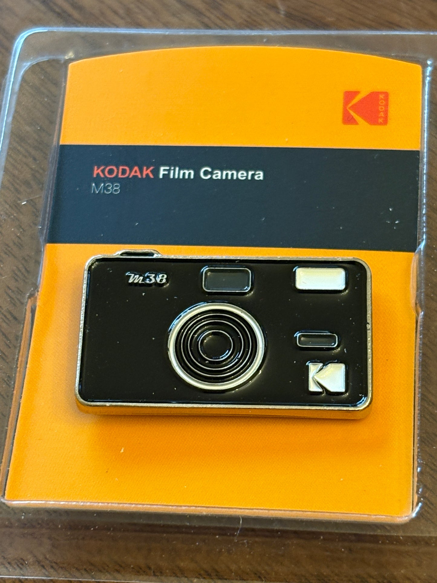 very rare  Kodak M38 pin badge black