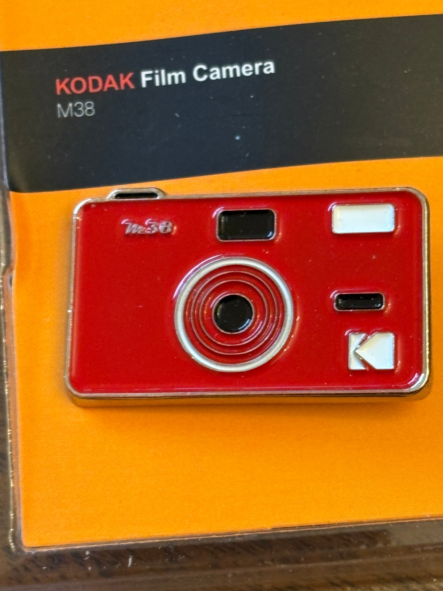 very rare  Kodak M38 pin badge red