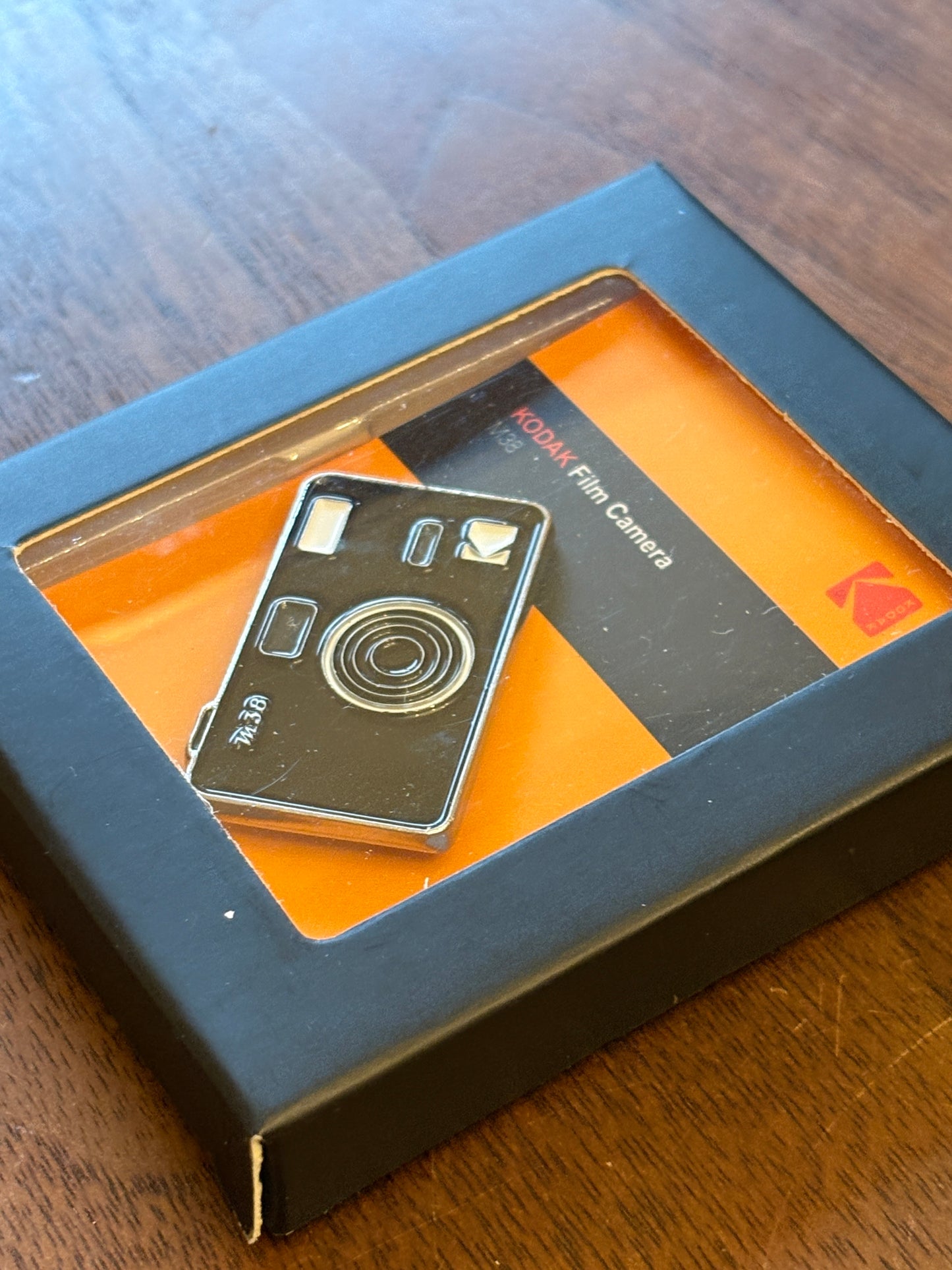 very rare  Kodak M38 pin badge black