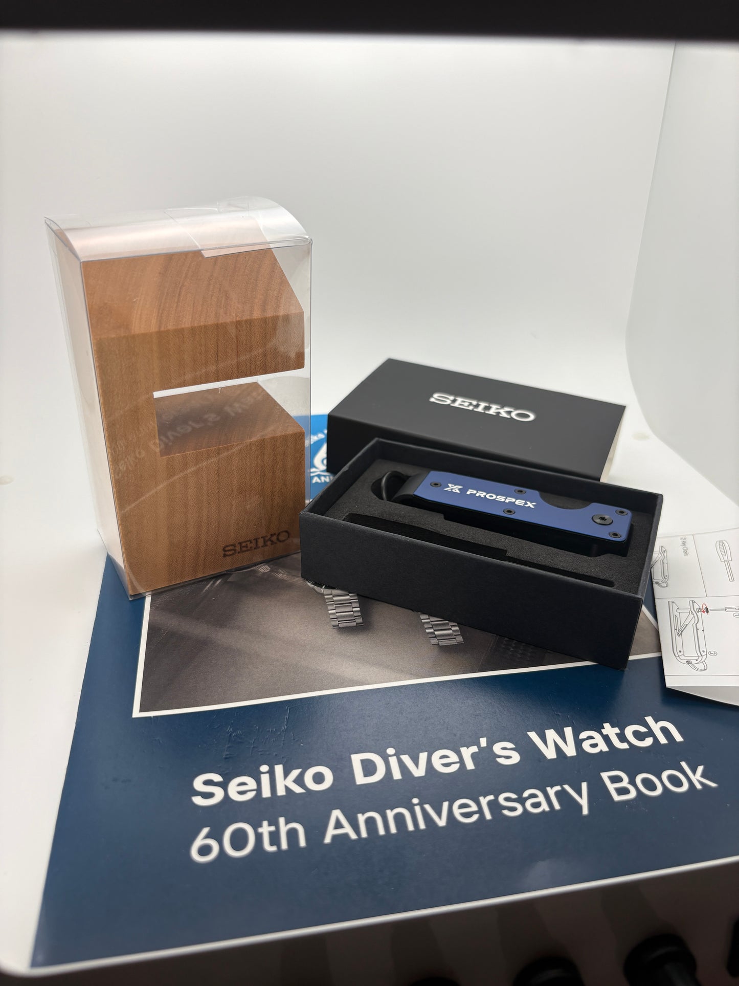 Seiko Watch display, key organizer, 150th-anniversary book