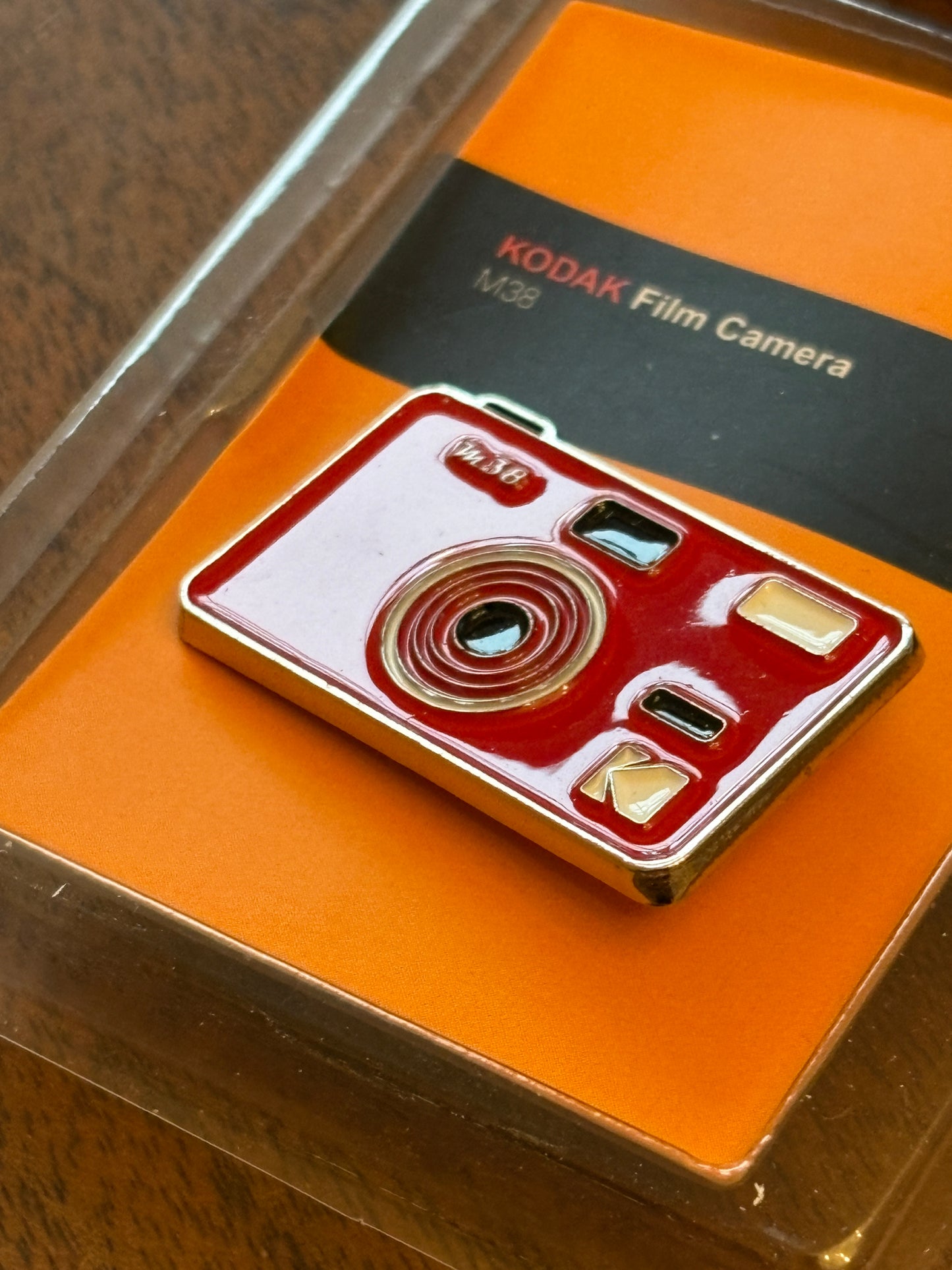 very rare  Kodak M38 pin badge red